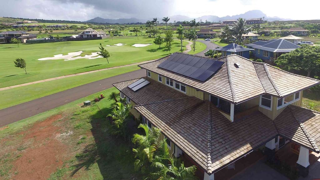 solar panels on roof next to golf course in hawaii
