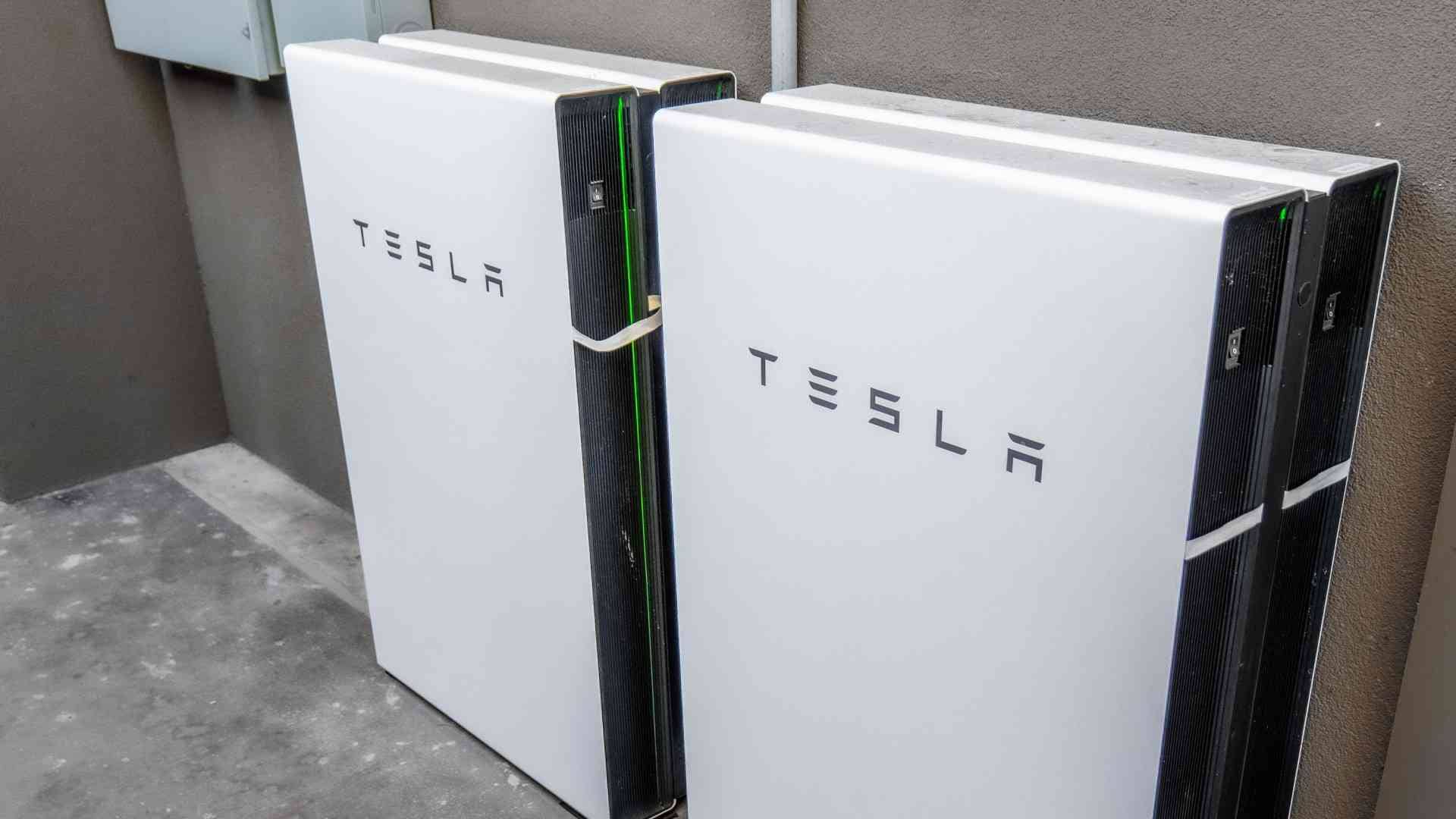 Two Tesla Powerwall batteries side by side on a wall in Oahu Hawaii